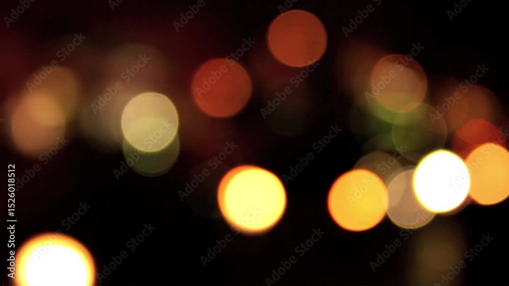 Night road lights blurred bokeh of cars in traffic on the road at night. Abstract bright blurred colored bokeh. Bokeh lights in the city night background. town streets in evening. Vehicles. effect