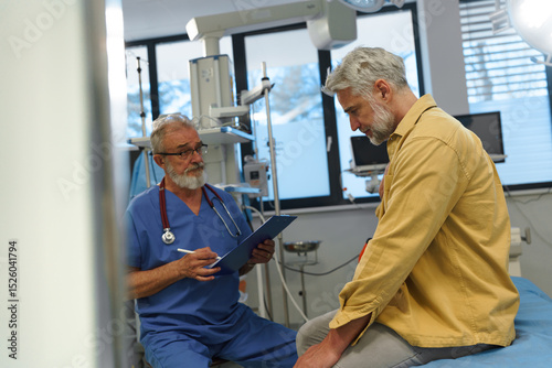 Upset patient on examination table, describing symptoms to doctor.
