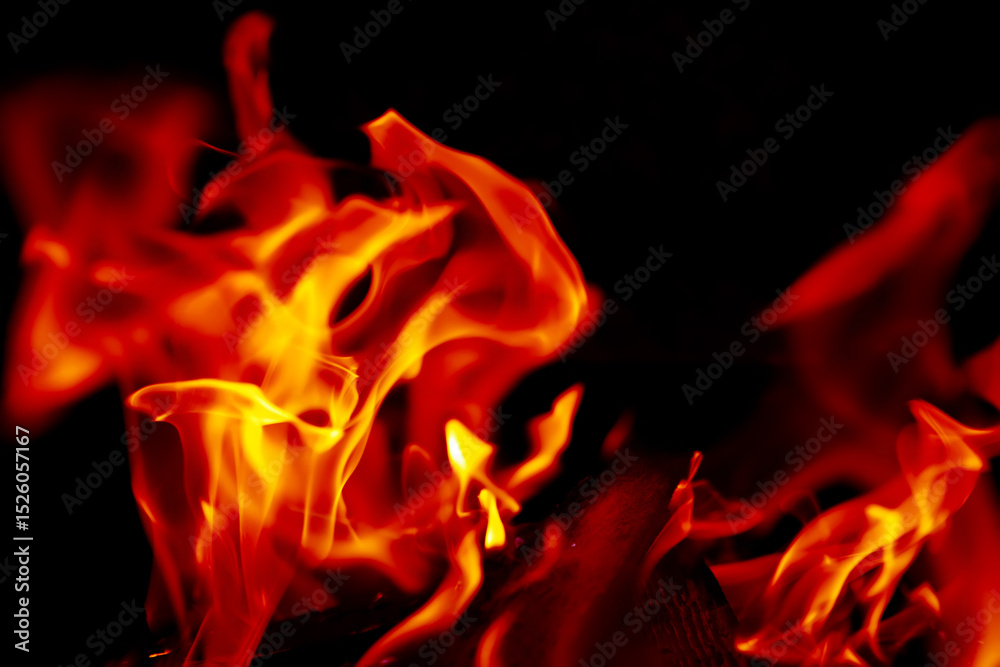 Fototapeta premium Background of the flame in the oven. Overlay layer. Tongues of fire in a fireplace.