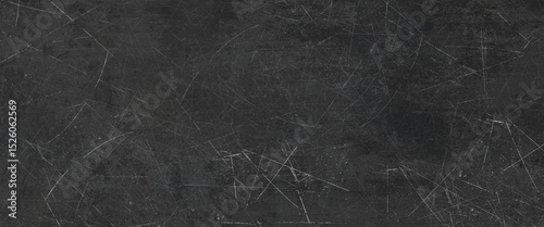 Detailed dark gray scratch textured surface perfect for grunge and modern design projects with numerous marks