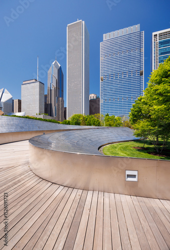 Wallpaper Mural Sunny view of downtown Chicago with iconic skyscrapers rising above a Millennium park Torontodigital.ca