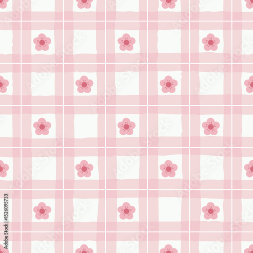 Seamless hand drawn plaid pattern with cute little flowers, pink floral and checkered background for textiles, fashion, scrapbooking, and home décor.