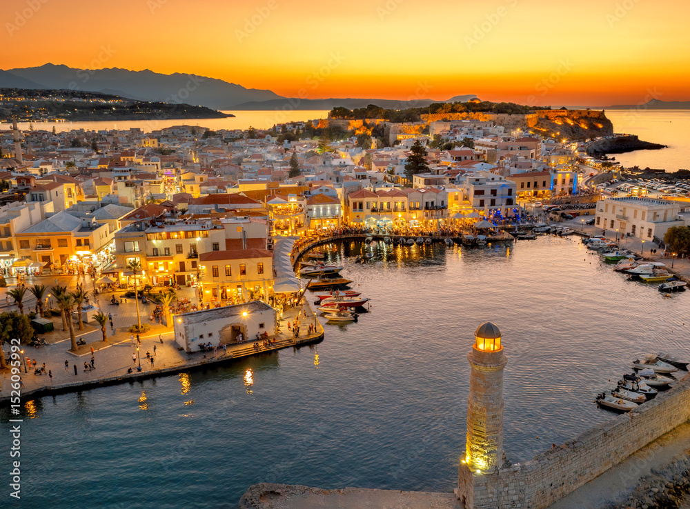 Naklejka premium Rethymno city at Crete island in Greece. Aerial view of the old venetian harbor and Venetian Fortezza Castle