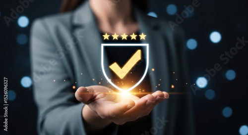 Quality Assurance and Compliance Certification Concept. Businesswoman presents glow shield icon with checkmark and five stars