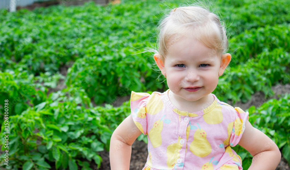 little girl in the garden. Selective focus little girl in the garden. Selective focus