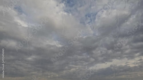 timelapse of the sky of shower rain with heavy mystical storm clouds