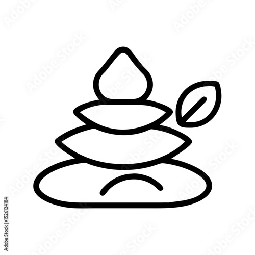 Zen garden with stacked stones and a leaf symbolizing tranquility  