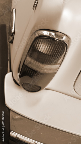 Vintage Car Tail Light Closeup Retro Detail Sepia Vertical Frame View. Classic Automobile Rear Lamp Macro Shot With Warm Toned Artistic Color