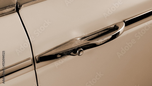 Vintage Car Door Handle Close Up in Sepia Tone with Soft Light