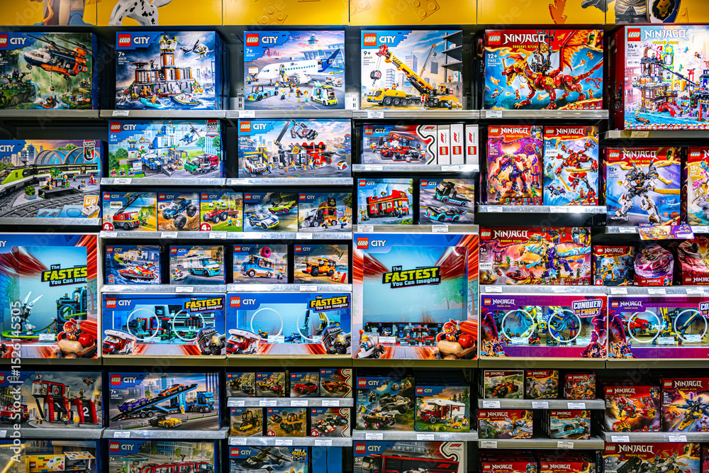 Obraz premium Sets of Lego construction toys displayed on store shelves