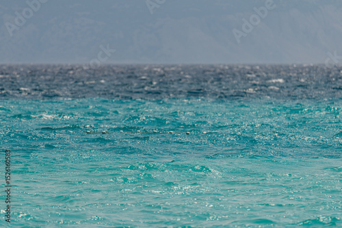 Beautiful turquoise and blue, wavy sea texture