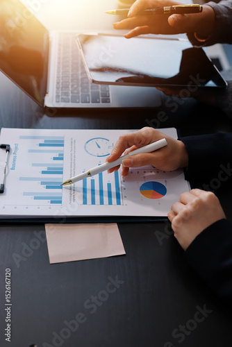 Accounting company provide finance and taxation planning for profitable cash flow, Auditor and accountant team working in office, analyze financial data and accounting record with calculator.Insight