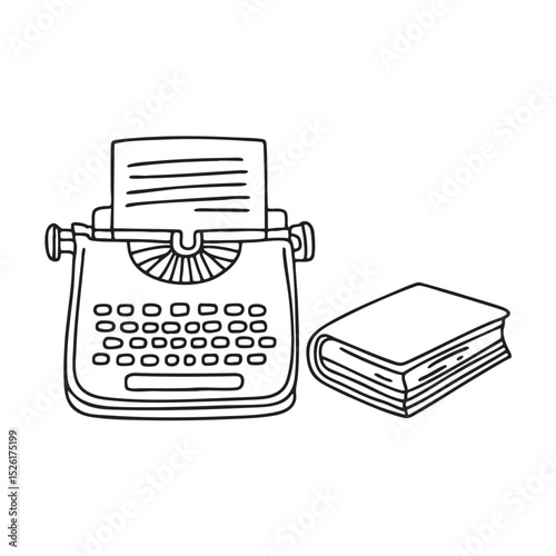 A typewriter resting next to a closed book
