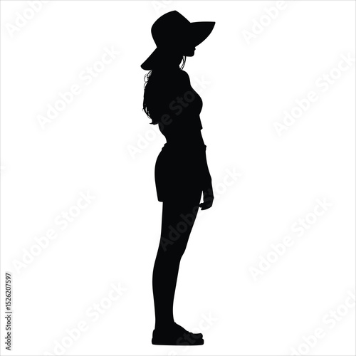 a graceful young girl standing and facing the horizon, wearing a wide floppy sunhat with a large brim and long flowing hair 