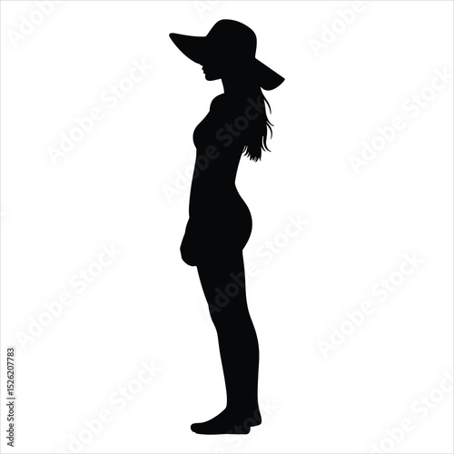 a graceful young girl standing and facing the horizon, wearing a wide floppy sunhat with a large brim and long flowing hair 