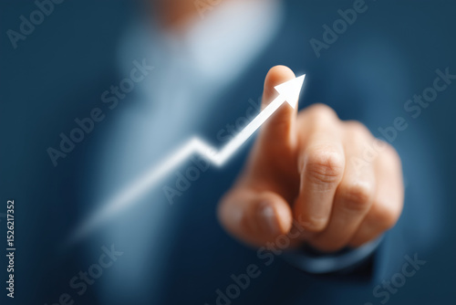 Businessman pointing arrow graph corporate future growth plan