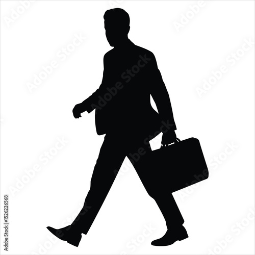 a male business traveler walking briskly in side view 