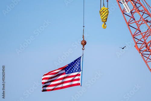american flag on a blue sky