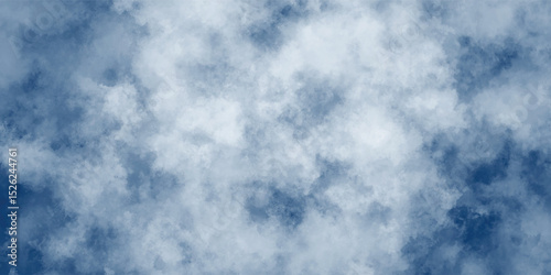 The serenity of infinite blue punctuated by the gentle, flowing movement of delicate clouds

