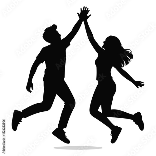 Silhouette of man and woman jumping high fiving each other