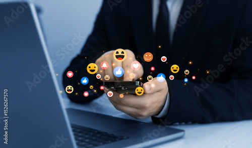 Person using smart phone with feedback icons of Social Media.Feedback or interactive with friends on chat or emoticon images appreciation.