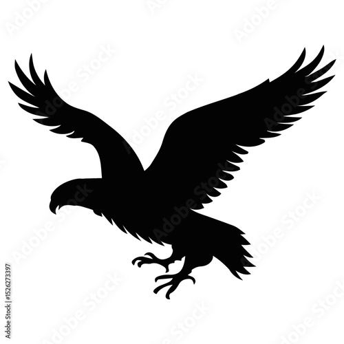 Silhouette of a bird of prey with its wings spread wide against a white background space