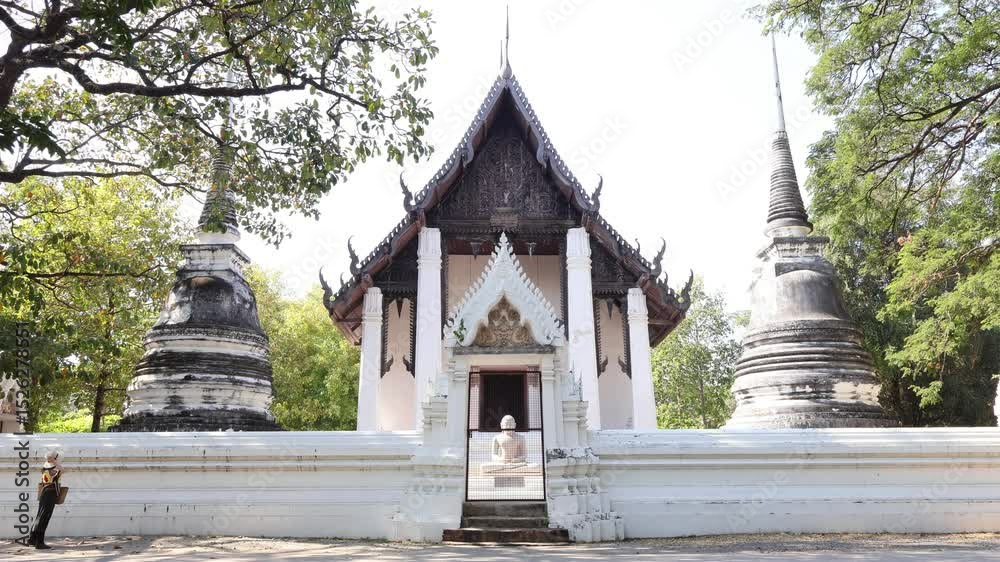 Footage of a Woman Appreciating Wat Thammaram Medieval Buddhist Temple from the Outside, Ayutthaya Historical Park, Thailand