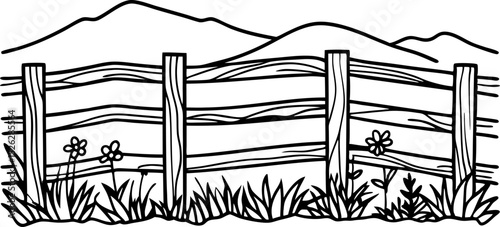 Wooden fence in rural landscape with distant mountains, wildflowers, and grassy field, countryside nature scene