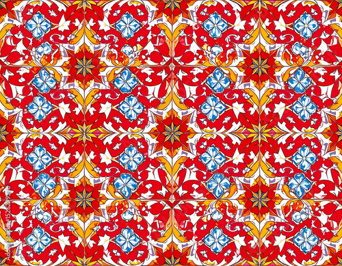 Colorful patterns of traditional alpana folk art adorn floors, symbolizing festive celebrations and cultural decoration.