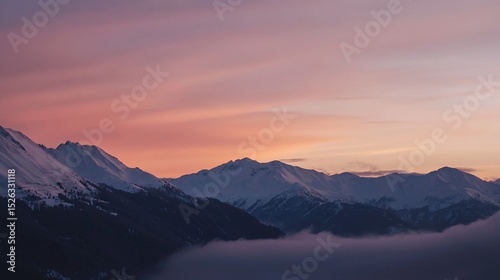 Tranquil Alpine Vista: Snow-Capped Peaks at Dusk Bathed in Golden Light