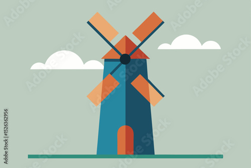 Old Dutch windmill in a green agricultural field under a blue sky