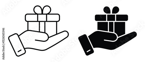 Gift box on hand showing concept icon of giving gift, line and solid style pictogram isolated. Gift box vector illustration. 
