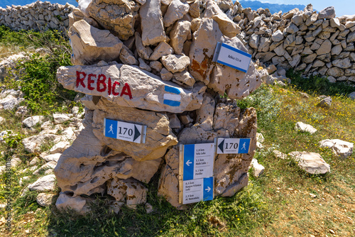 Fototapeta Naklejka Na Ścianę i Meble -  Panorama of the bay with the Vela Luka beach below, view of the beach from the top of the mountain, rocky beach