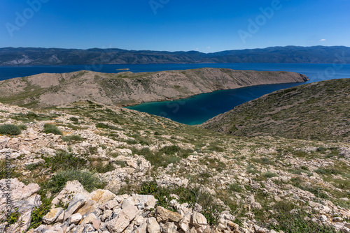 Fototapeta Naklejka Na Ścianę i Meble -  Panorama of the bay with the Vela Luka beach below, view of the beach from the top of the mountain, rocky beach