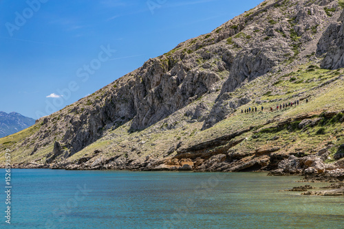 Fototapeta Naklejka Na Ścianę i Meble -  Panorama of the bay with the Vela Luka beach below, view of the beach from the top of the mountain, rocky beach
