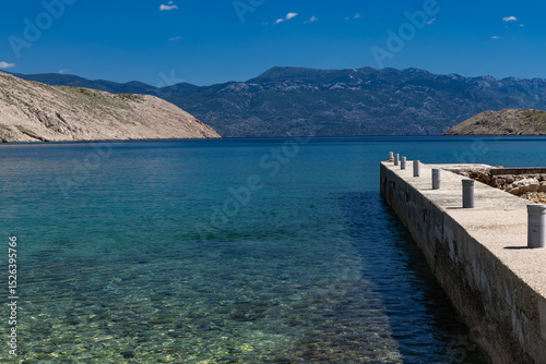 Fototapeta Naklejka Na Ścianę i Meble -  Panorama of the bay with the Vela Luka beach below, view of the beach from the top of the mountain, rocky beach