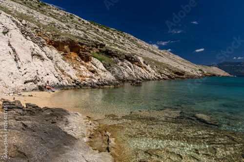 Fototapeta Naklejka Na Ścianę i Meble -  Panorama of the bay with the Vela Luka beach below, view of the beach from the top of the mountain, rocky beach