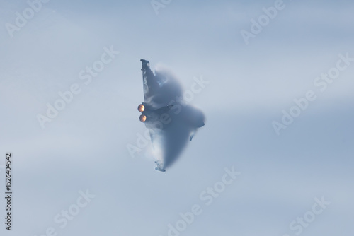 Eurofigher typhoon with after burner in action - display - after burner - war plane / fighter jet