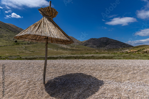Fototapeta Naklejka Na Ścianę i Meble -  Panorama of the bay with the Vela Luka beach below, view of the beach from the top of the mountain, rocky beach