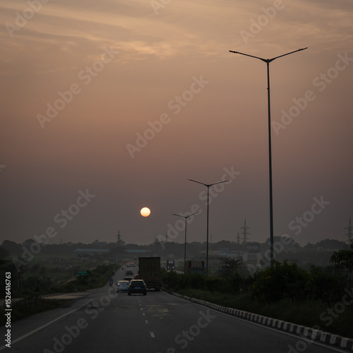 Golden misty evening sunset drive in india - Indian motorway, Indian highway, road trips in sunset. 