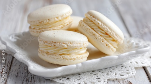 Delicious Vanilla Macarons on a Decorative White Plate