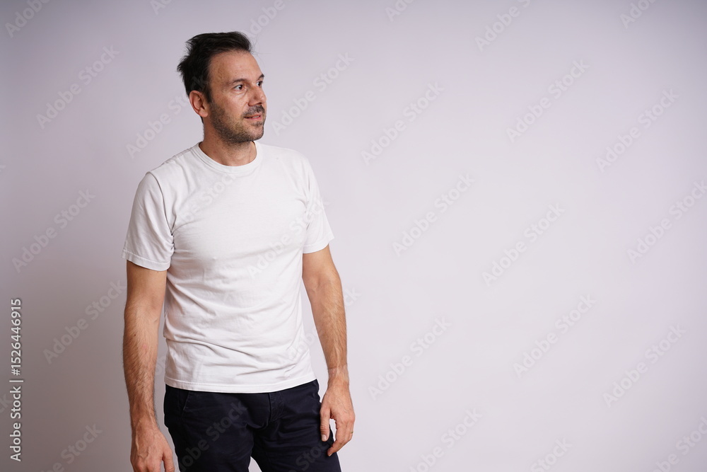 Fototapeta premium Male Model Showing Different Emotions on White Studio Background