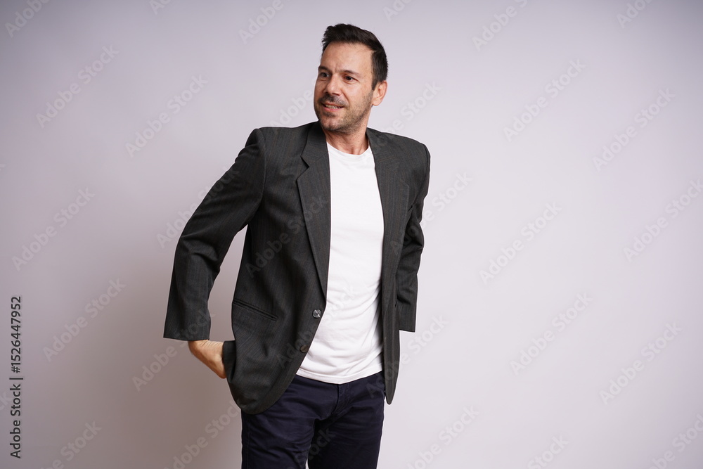 Fototapeta premium Male Model Showing Different Emotions on White Studio Background