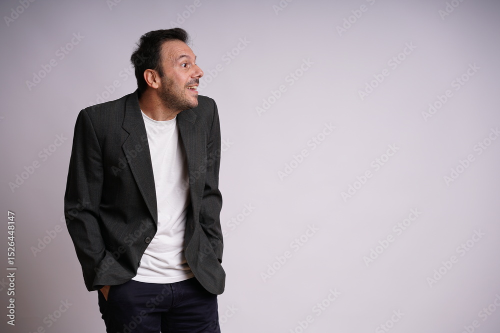 Fototapeta premium Male Model Showing Different Emotions on White Studio Background