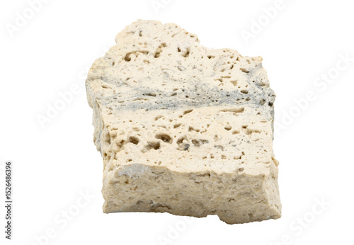 Close-up of mineral travertine marble, isolated on white background