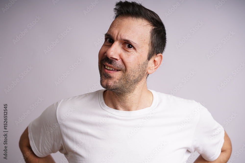 Obraz premium Male Model Showing Different Emotions on White Studio Background