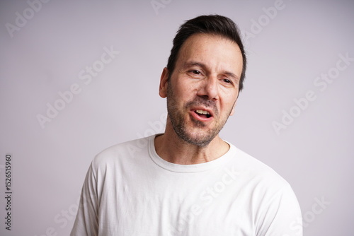 Male Model Showing Different Emotions on White Studio Background