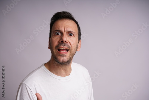 Male Model Showing Different Emotions on White Studio Background