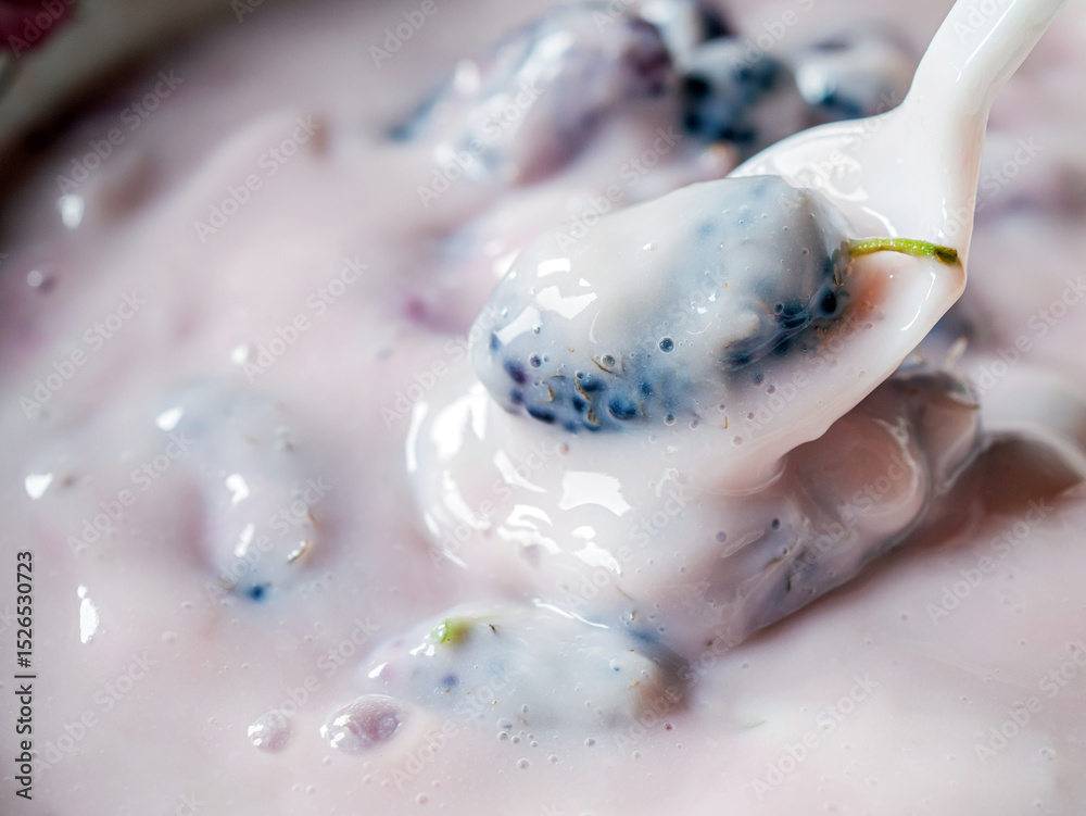 Fototapeta premium Macro texture of Tasty fruit yogurt background