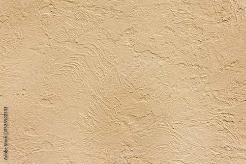 Beautiful uneven beige texture. Neutral decorative background.